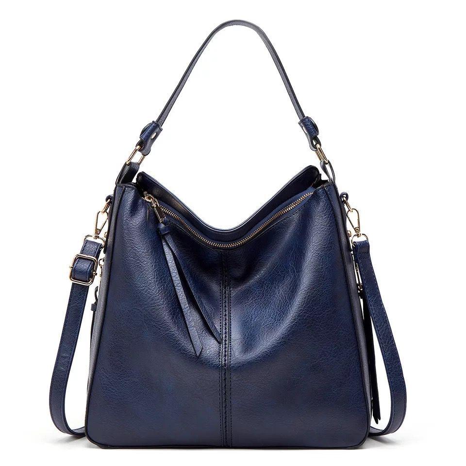 Levoire | Sac En Cuir Avec Grande Capacité Et Poches Latérales Merensininen