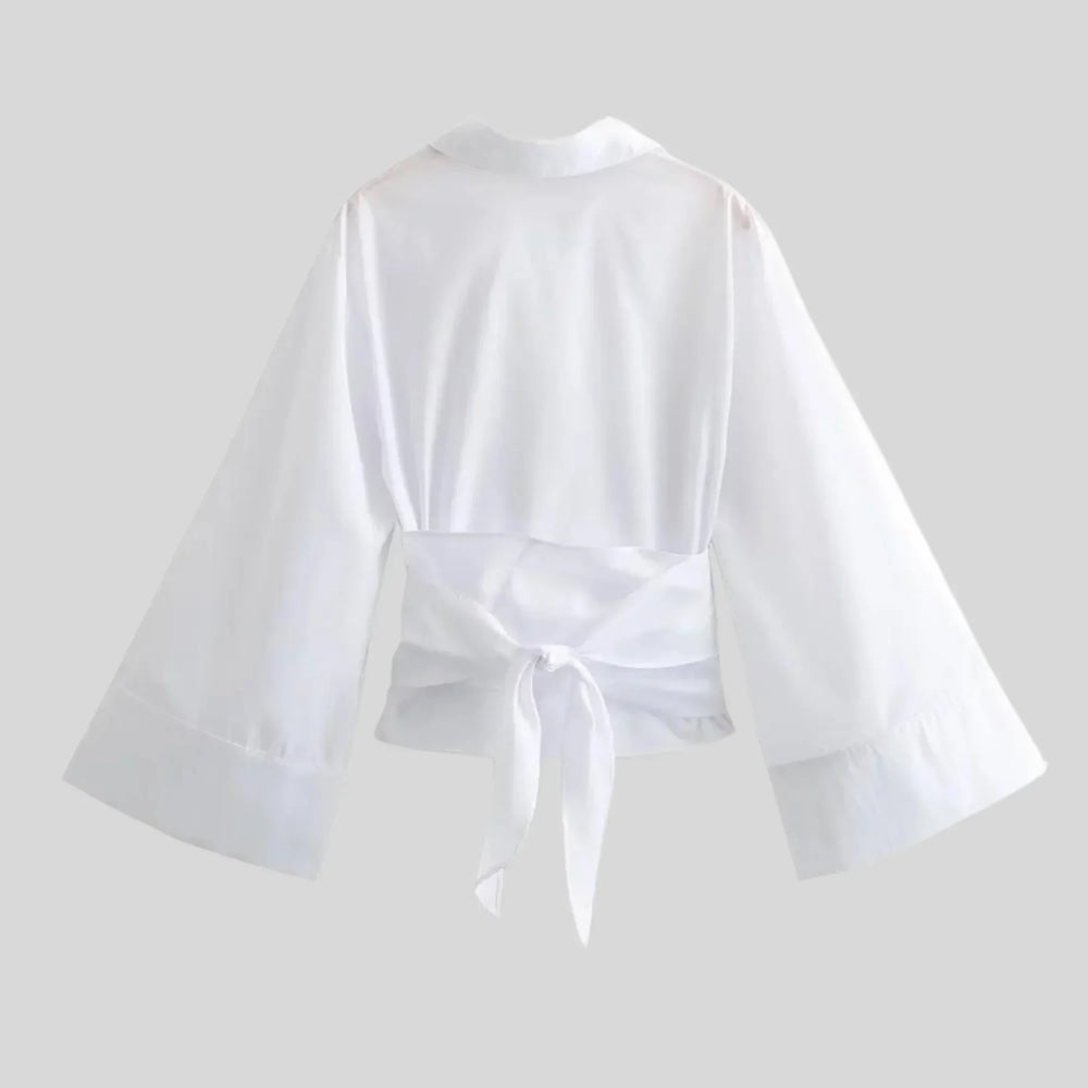 Levoire | Haut Ventilé Et Élégant Avec Deux Rangées De Boutons Et Col En V