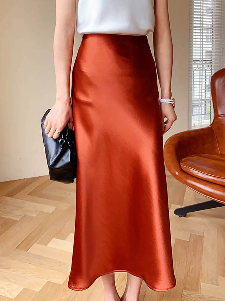 Levoire | La élégante jupe midi en satin Orange