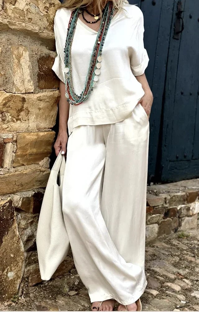 Levoire | Élégant Haut Blanc Avec Encolure En V Et Pantalon À Jambe Large