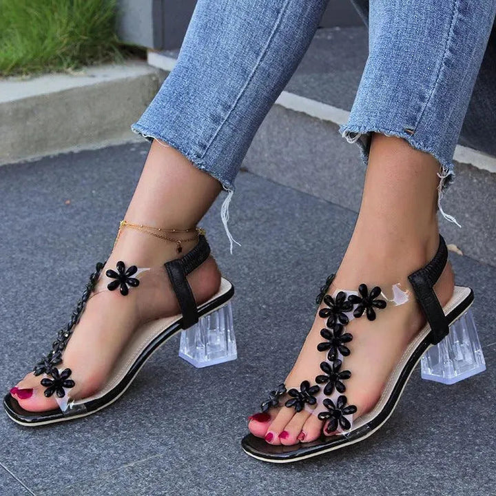 Levoire | Sandales à la mode avec des fleurs et un talon transparent carré Noir