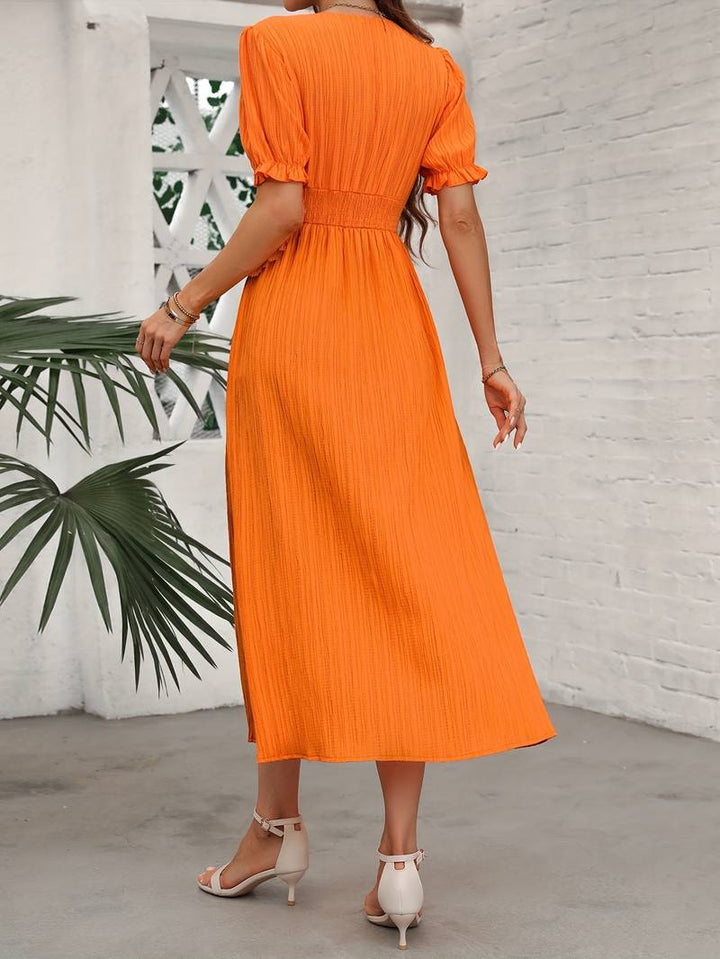 Levoire | Robe Orange À Col En V Avec Fente Pour Femmes
