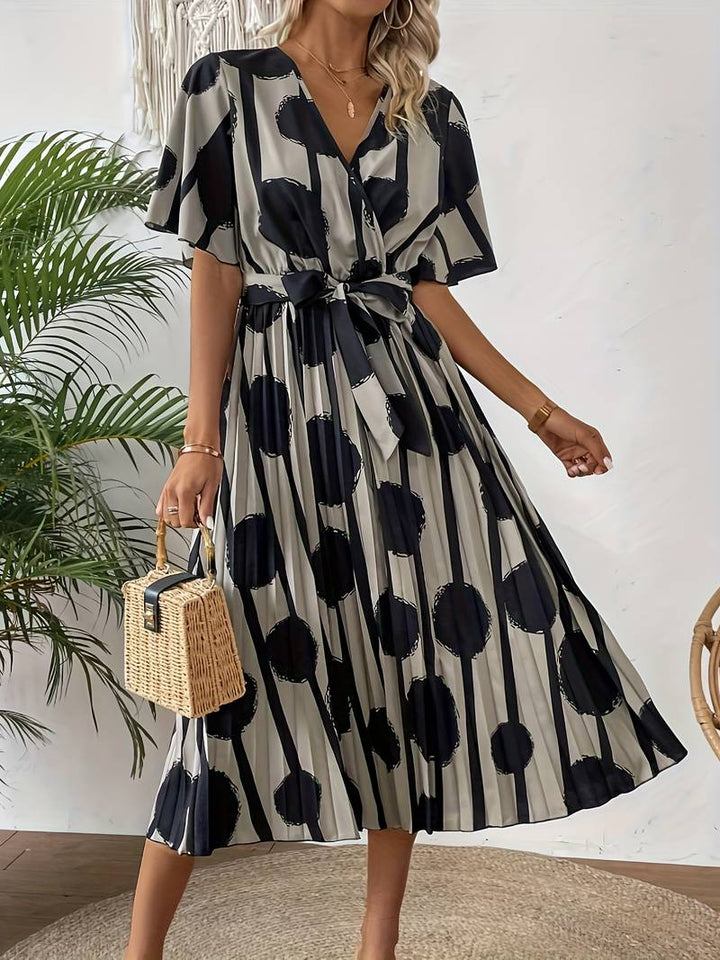 Levoire | Élégante Robe Midi À Manches Courtes Avec Imprimé Intégral