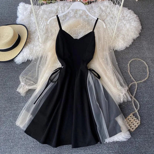 Levoire | Robe en forme A avec des bretelles bouffantes et un décolleté en V