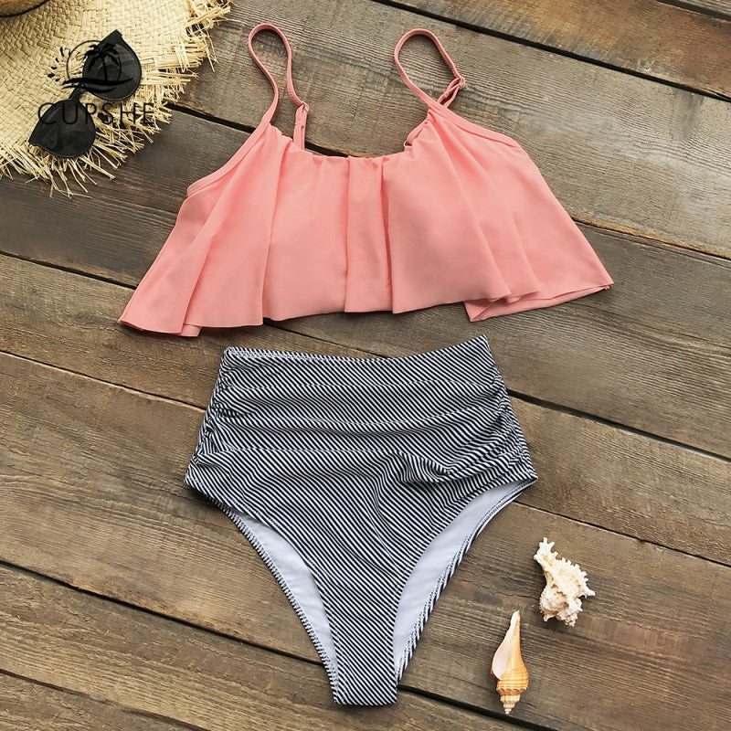 Levoire | Une Robe Colorée Avec Des Volants Rosa