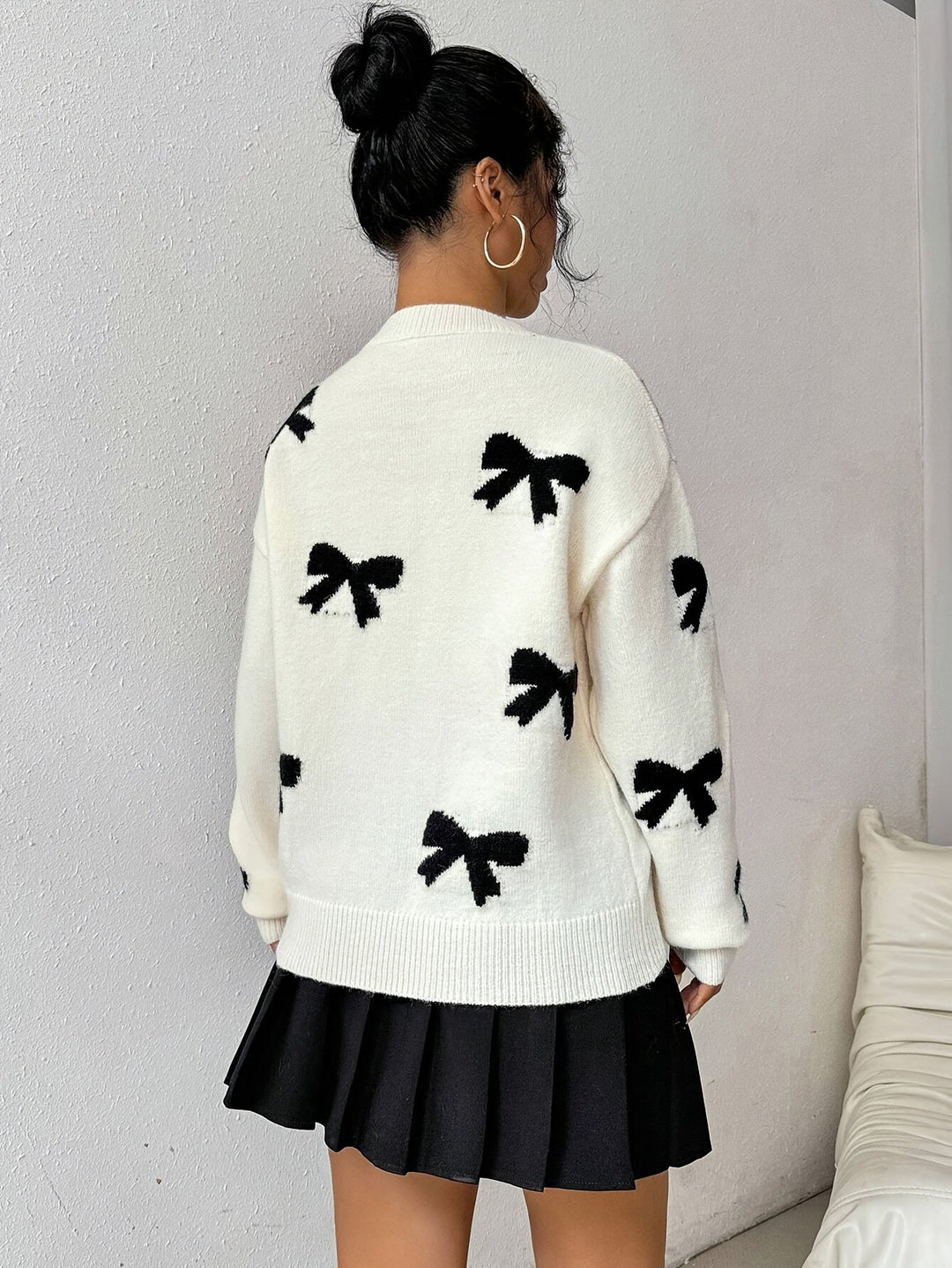 Levoire | Pull à motifs courbés en tricot à col rond à manches longues