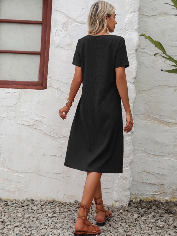 Levoire | Robe en coton à col montant à manches courtes avec plumes unies