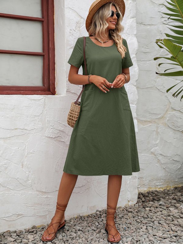 Levoire | Robe en coton à col montant à manches courtes avec plumes unies