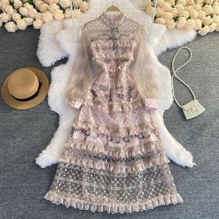 Levoire | Robe élégante avec des œillets en dentelle brodés Rosa Une taille