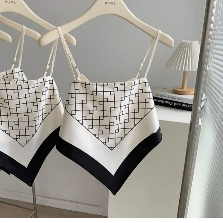 Levoire | Top avec bretelles et nœud en satin Couleur de l'image