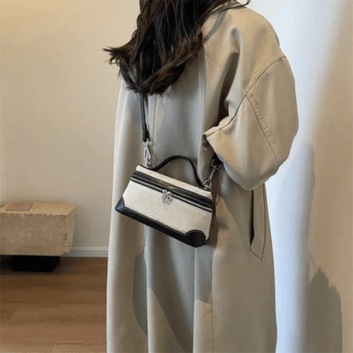Levoire | Sac bandoulière en toile avec sangle réglable et accents en cuir