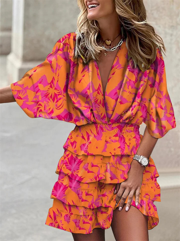 Levoire | Robe imprimée irrégulière avec encolure en V sur le pouce Orange