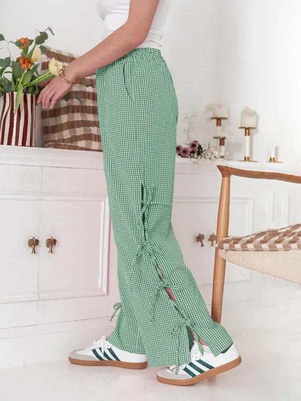 Levoire | Mode dames pantalons carotte avec motif à carreaux et bretelles