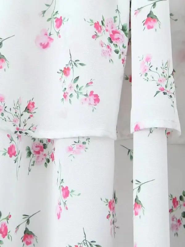 Levoire | Robe à lacets imprimée à pointes avec des bandeaux de taille superposés