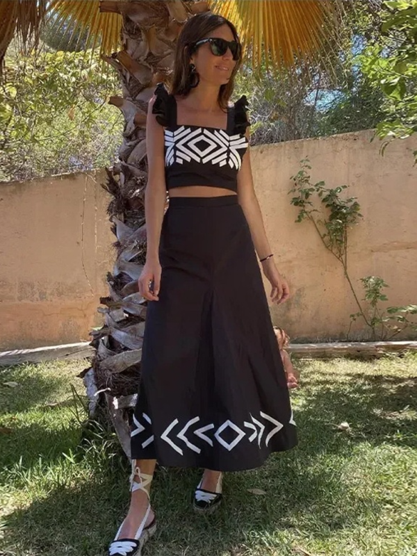 Levoire | Mode, hi-hat, ondulé, gilet imprimé et robe à jupe Musta