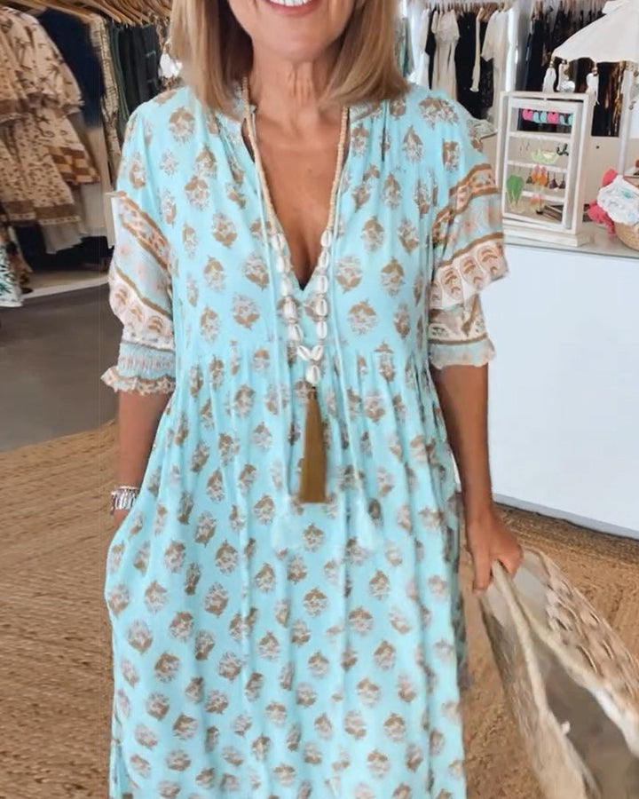 Levoire | Robe De Printemps Élégante Avec Décolleté En V Et Silhouette En A Bleu
