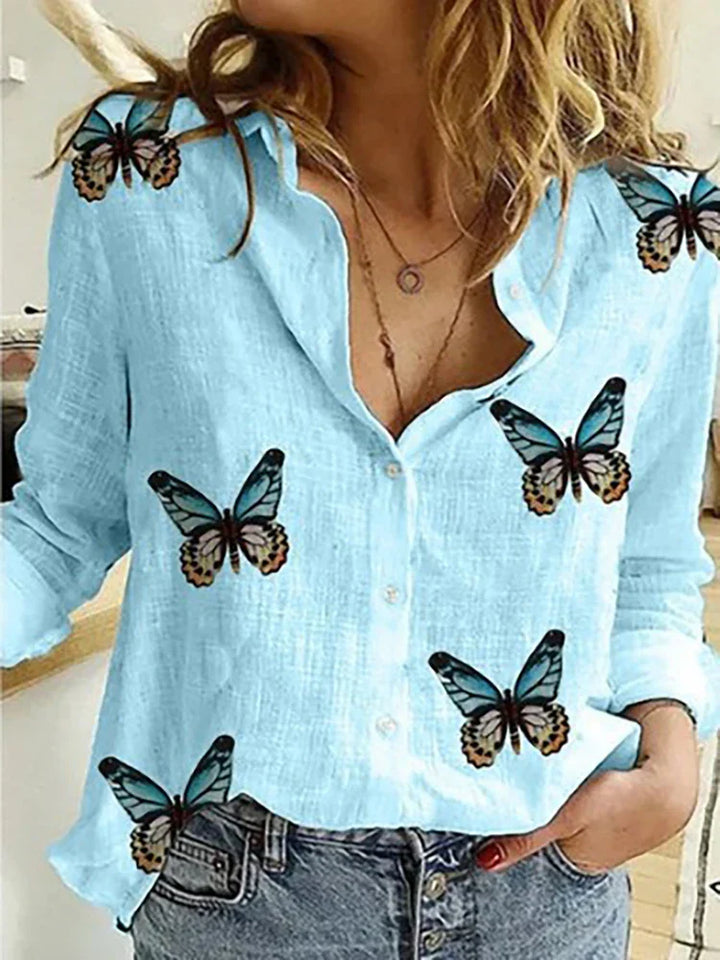 Levoire | Blouses Pour Femmes À Motifs Avec Une Rangée De Boutons Et Des Manches Longues Bleu clair avec des papillons