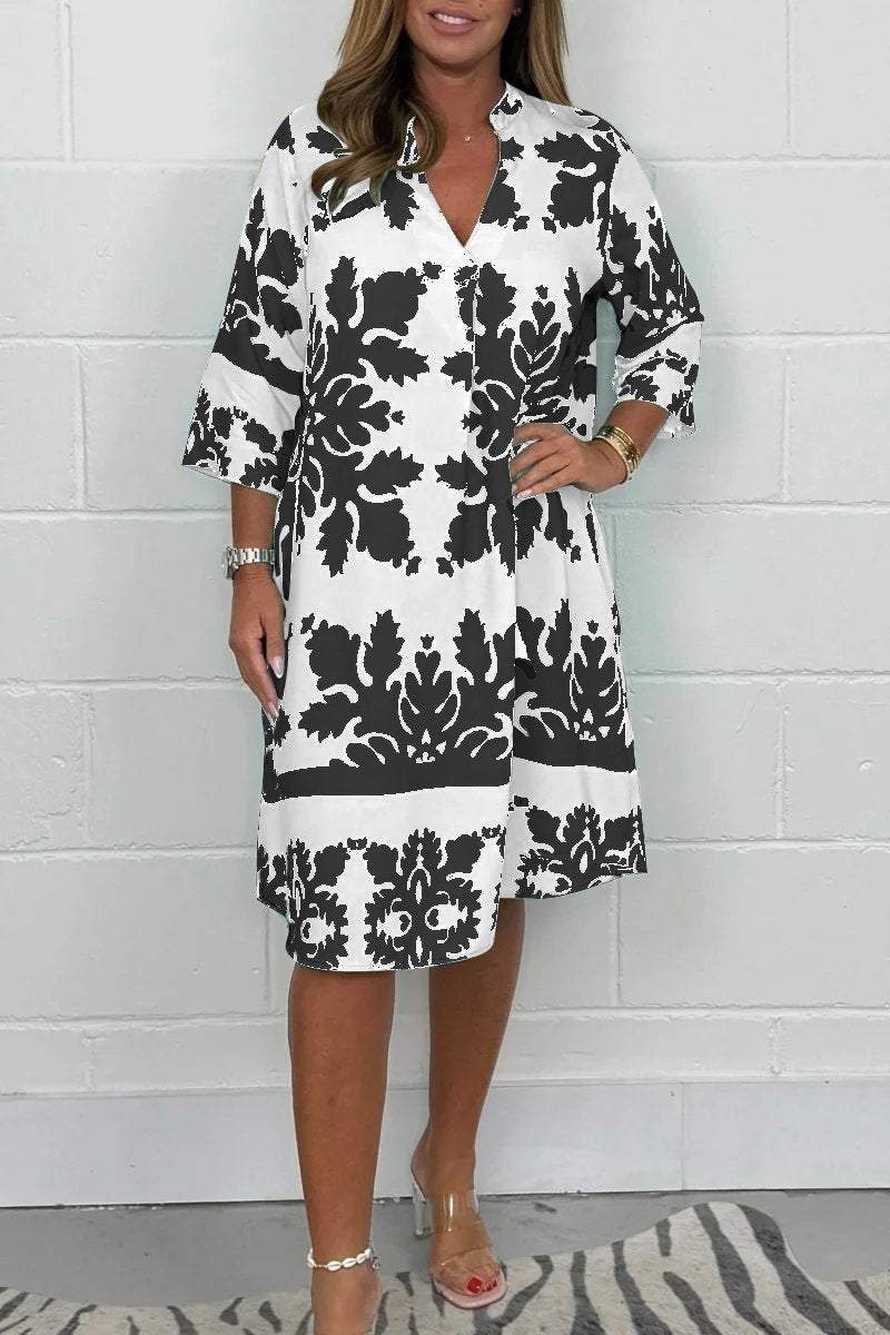 Levoire | Élégante Robe De Printemps Avec Décolleté En V Et Manches Longues Noir et Blanc