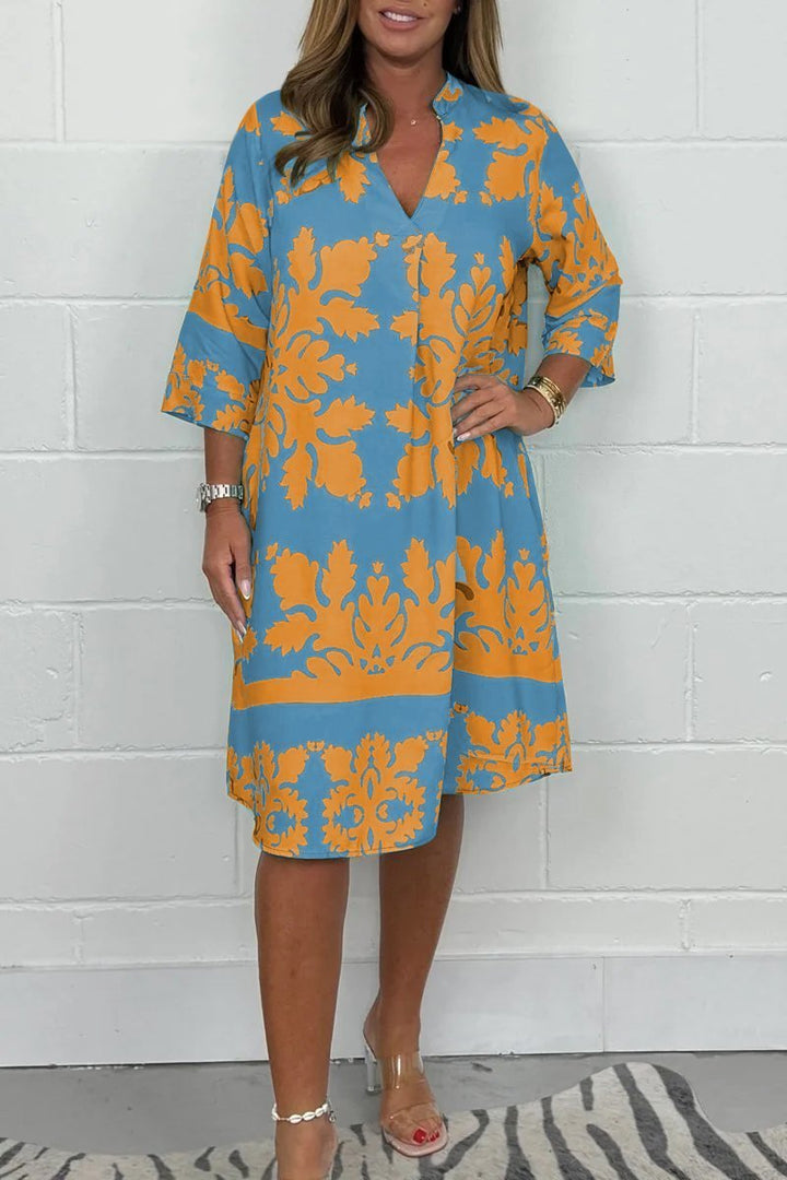 Levoire | Élégante Robe De Printemps Avec Décolleté En V Et Manches Longues Orange et Bleu