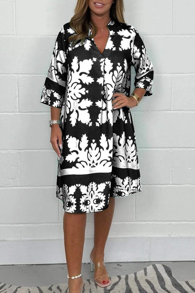 Levoire | Élégante Robe De Printemps Avec Décolleté En V Et Manches Longues Blanc et Noir