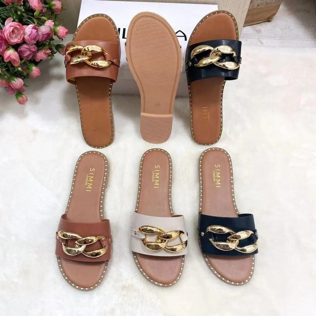Levoire | Chaussons avec design boucle dorée
