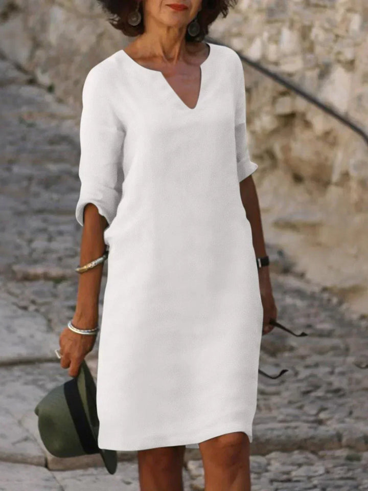 Levoire | Élégante Robe À Décolleté En V Avec Des Manches Retroussées Pour Femmes Blanc