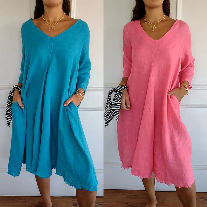 Levoire | Col en V poches latérales robe