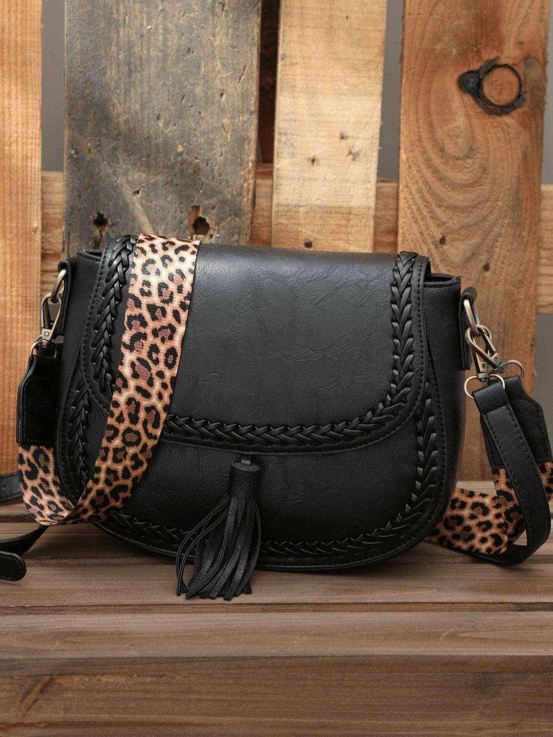 Levoire | Sacoche De Selle En Cuir Vegan Stylée Noir avec ceinture en motif léopard