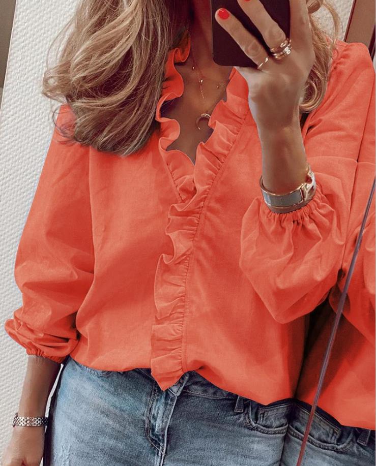 Levoire | Blouse avec volants et décolleté en V orange